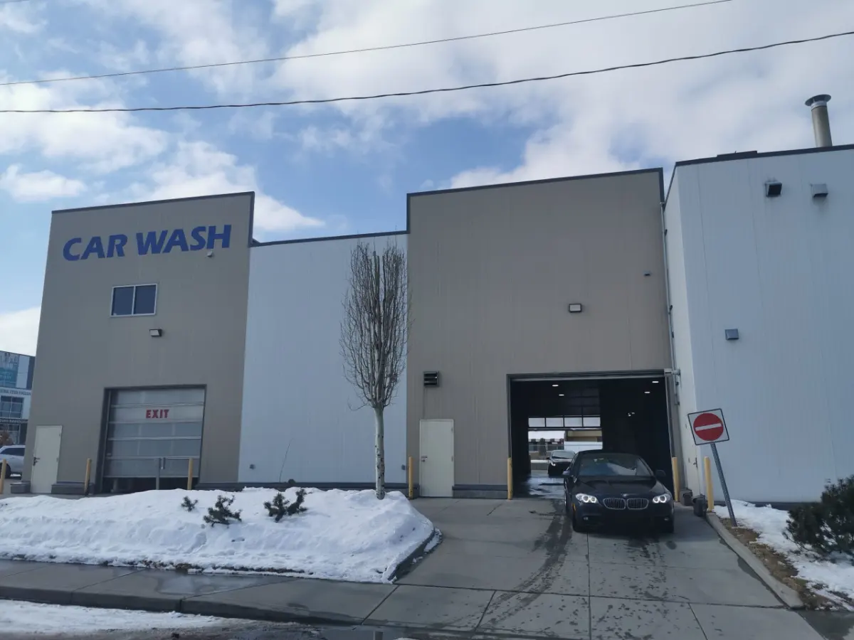 Car entering the Arctic Autowash touchless wash on a winter day in Edmonton
